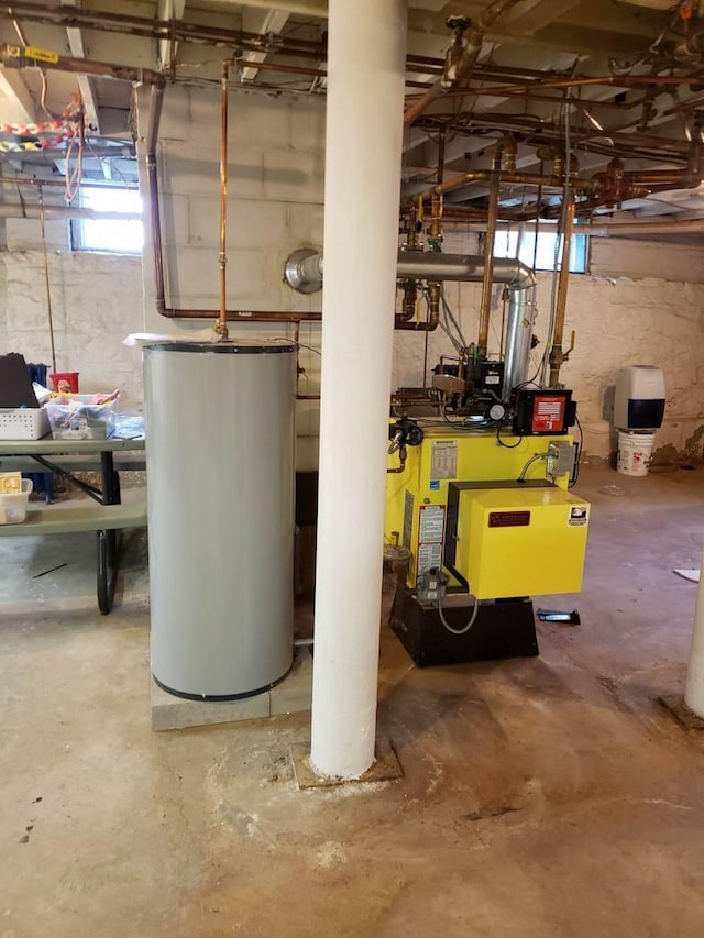utility room with water heater