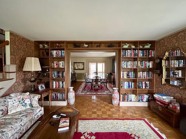 living area featuring wallpapered walls