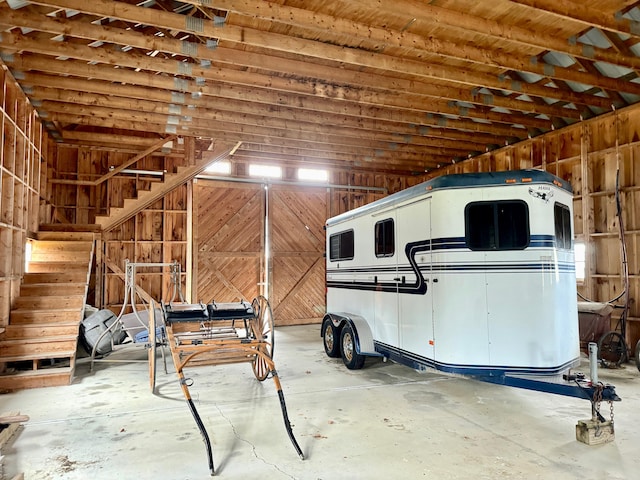garage with wood walls