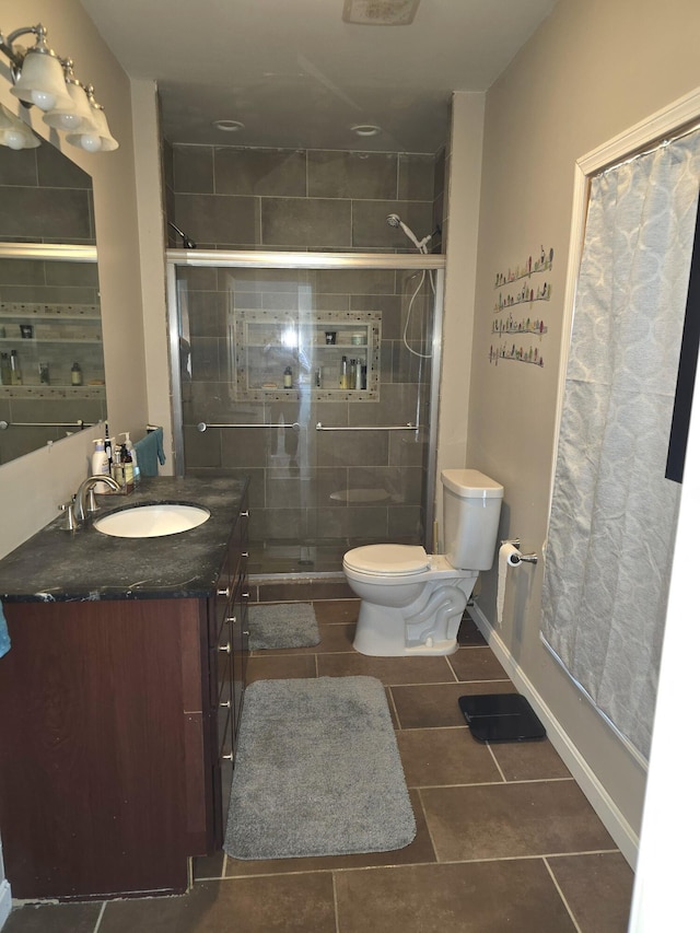 10 Middle St, Lisbon, ME 04252 - full bathroom with toilet, a shower stall, tile patterned flooring, and vanity