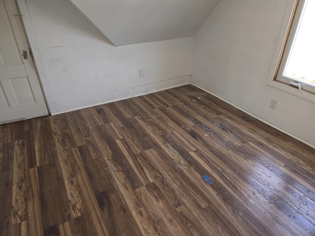 10 Middle St, Lisbon, ME 04252 - additional living space with baseboards, dark wood-type flooring, and lofted ceiling
