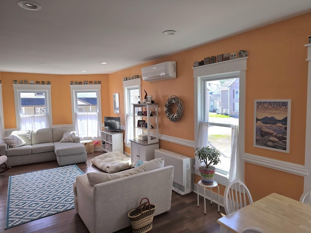10 Middle St, Lisbon, ME 04252 - living room with plenty of natural light, recessed lighting, a wall unit AC, and dark wood-type flooring