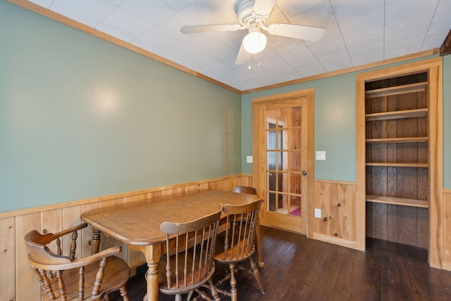 61 Westmore Ave, Biddeford, ME 04005 - dining room with a wainscoted wall, hardwood / wood-style floors, a ceiling fan, wooden walls, and ornamental molding
