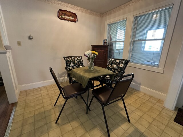 dining room featuring baseboards