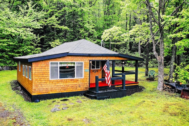 view of outbuilding with a view of trees