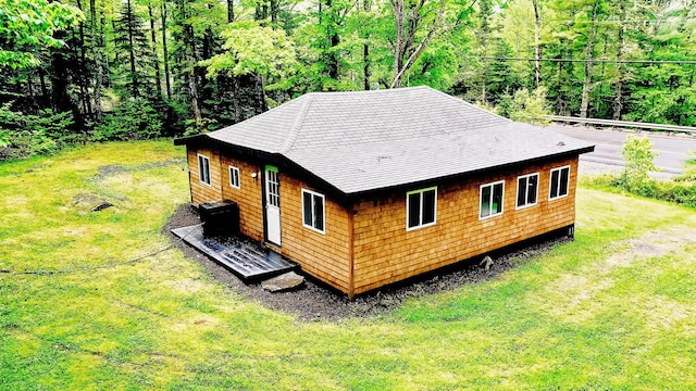 exterior space featuring a forest view