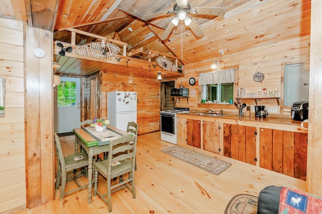 kitchen featuring wood ceiling, wood walls, vaulted ceiling, and white appliances