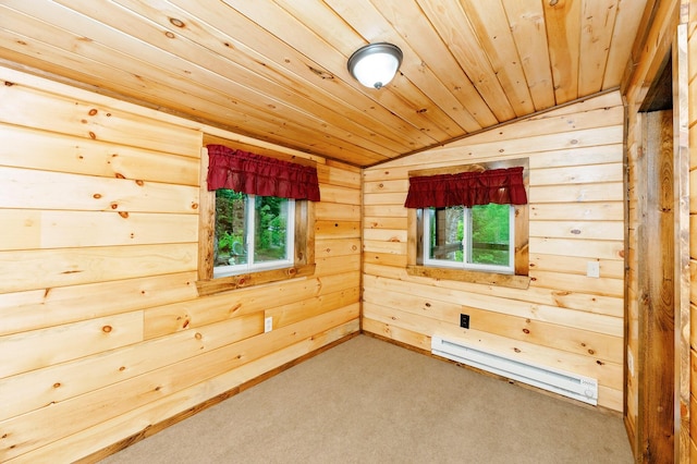 carpeted empty room with wood walls, a baseboard heating unit, wood ceiling, and vaulted ceiling