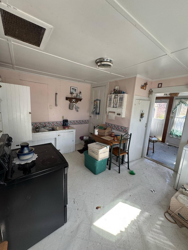 dining area with light floors and visible vents