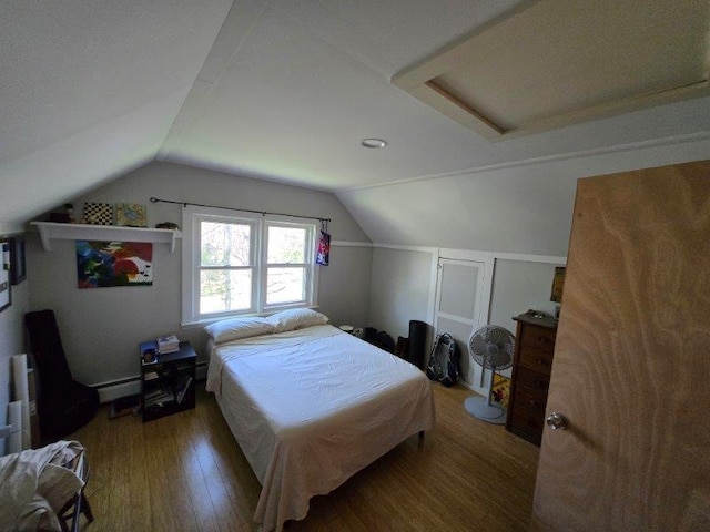 9 Allen Avenue Ext, Falmouth, ME 04105 - bedroom with lofted ceiling and wood finished floors