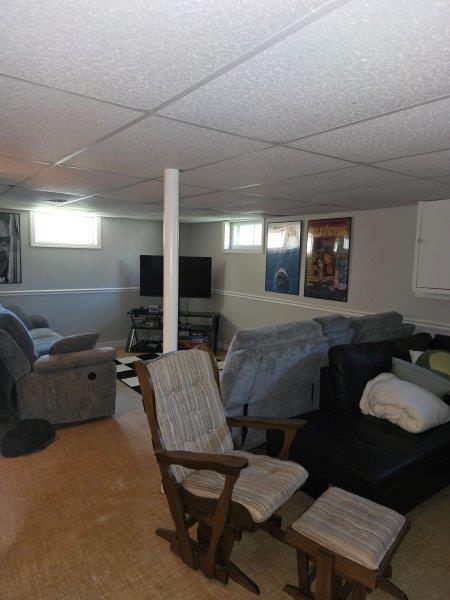 9 Allen Avenue Ext, Falmouth, ME 04105 - interior space featuring a paneled ceiling, carpet flooring, and a healthy amount of sunlight