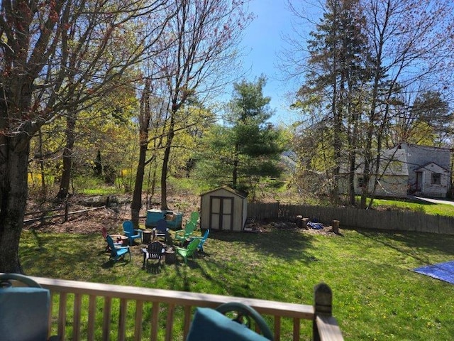 9 Allen Avenue Ext, Falmouth, ME 04105 - view of yard with an outdoor fire pit, fence, a shed, and an outbuilding