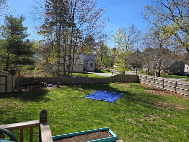 9 Allen Avenue Ext, Falmouth, ME 04105 - view of yard with an outdoor structure, a shed, and a fenced backyard