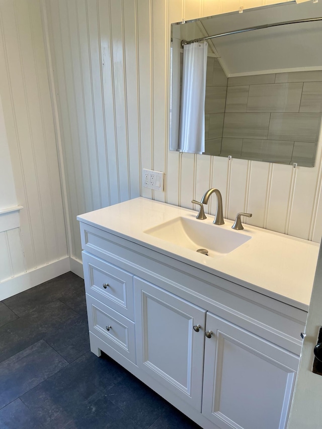 bathroom with vanity and a shower with shower curtain