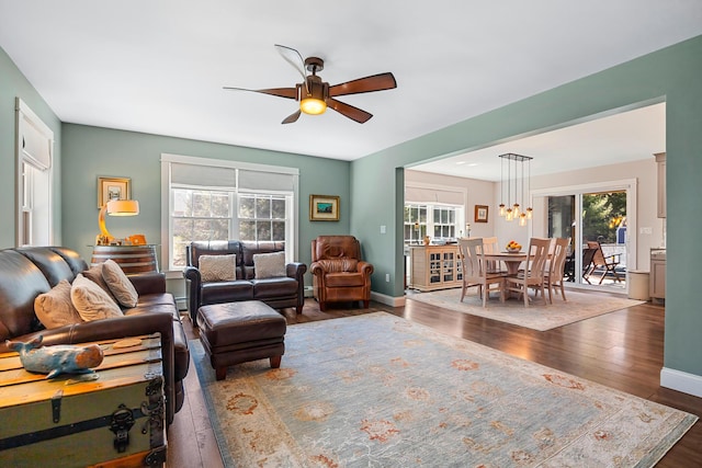 35 Graystone Dr, Hampden, ME 04444 - living room featuring baseboards, ceiling fan, and wood finished floors