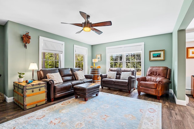 35 Graystone Dr, Hampden, ME 04444 - living room featuring baseboards, a ceiling fan, wood finished floors, and a healthy amount of sunlight