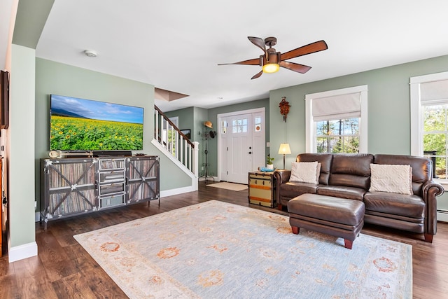 35 Graystone Dr, Hampden, ME 04444 - living room with baseboards, ceiling fan, stairs, and wood finished floors