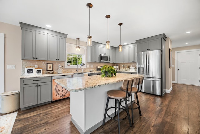 35 Graystone Dr, Hampden, ME 04444 - kitchen with dark wood-type flooring, appliances with stainless steel finishes, and gray cabinetry