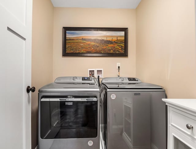 35 Graystone Dr, Hampden, ME 04444 - laundry area with washer and dryer and cabinet space