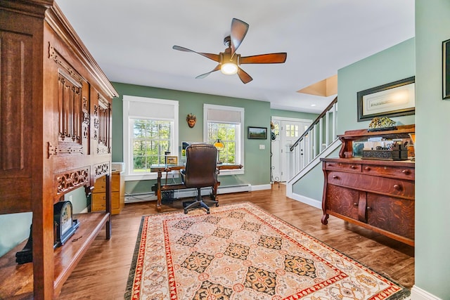 35 Graystone Dr, Hampden, ME 04444 - office area featuring baseboards, a ceiling fan, a baseboard heating unit, and wood finished floors