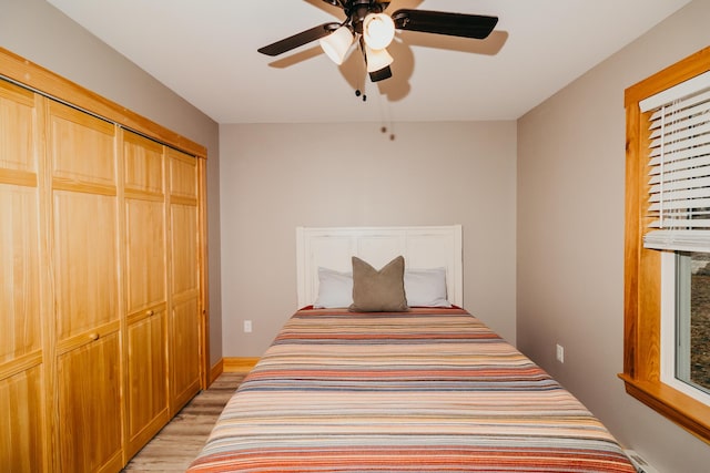 104 Hamlin Rd, Waterford, ME 04088 - bedroom featuring a closet, a ceiling fan, and light wood-style flooring