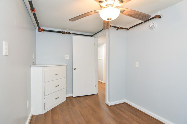7 Bay Ave Unit 2, Old Orchard Beach, ME 04064 - below grade area featuring wood finished floors, a ceiling fan, and baseboards