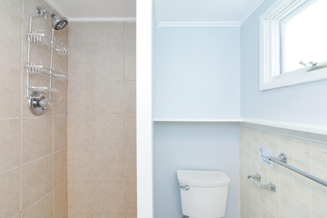 7 Bay Ave Unit 2, Old Orchard Beach, ME 04064 - full bathroom with a tile shower, ornamental molding, and toilet