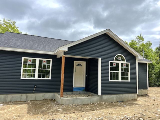 9 Morgan Ln, Limington, ME 04049 - view of front facade featuring a shingled roof
