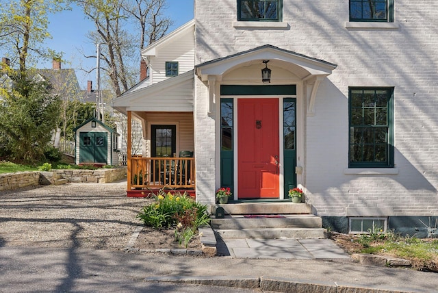 11 Linden St, Bath, ME 04530 - entrance to property with covered porch and brick siding