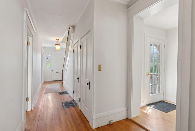 11 Linden St, Bath, ME 04530 - hallway featuring visible vents, baseboards, and hardwood / wood-style floors