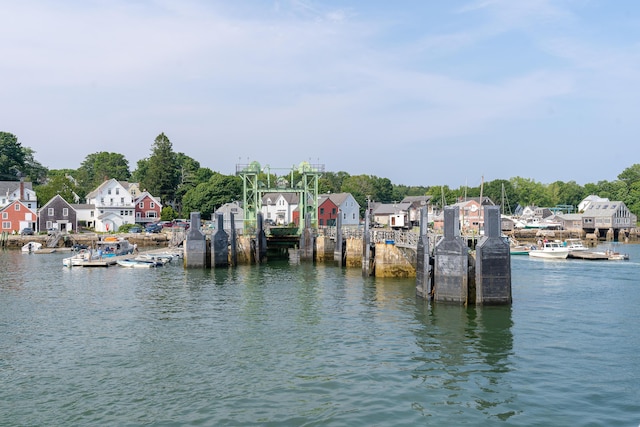651 N Shore Rd, North Haven, ME 04853 - dock area featuring a water view and a residential view