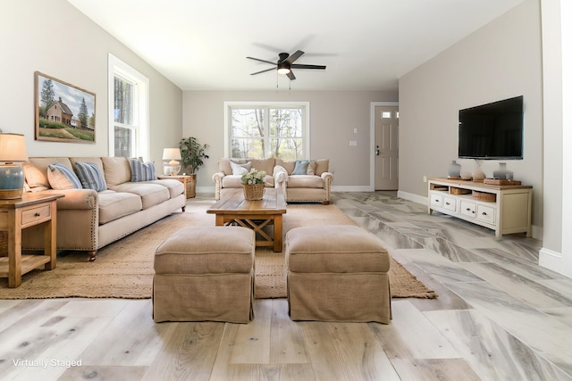 32 Rockwood Dr, Harrison, ME 04040 - living area featuring baseboards, light wood finished floors, and ceiling fan