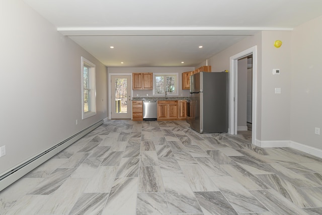 32 Rockwood Dr, Harrison, ME 04040 - kitchen with brown cabinetry, baseboards, recessed lighting, a baseboard radiator, and stainless steel appliances