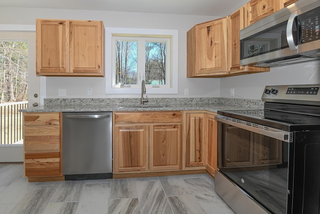 32 Rockwood Dr, Harrison, ME 04040 - kitchen featuring a sink, appliances with stainless steel finishes, and light stone counters