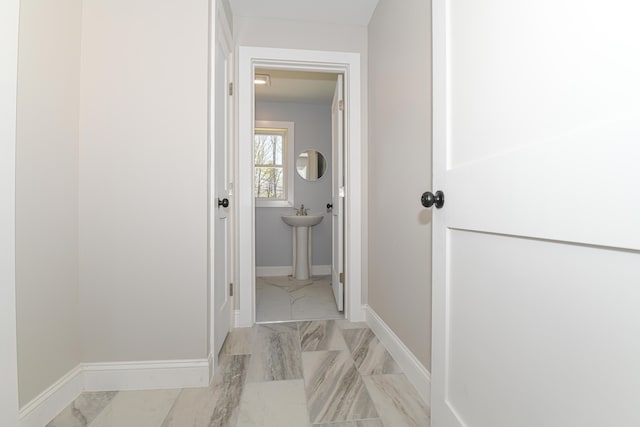 32 Rockwood Dr, Harrison, ME 04040 - corridor featuring baseboards and marble finish floor