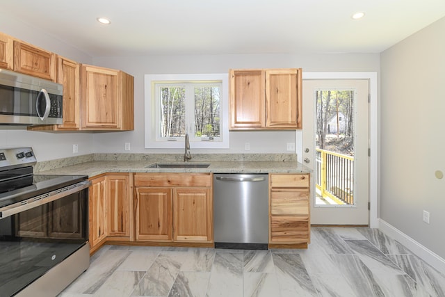 32 Rockwood Dr, Harrison, ME 04040 - kitchen with recessed lighting, appliances with stainless steel finishes, a wealth of natural light, and a sink