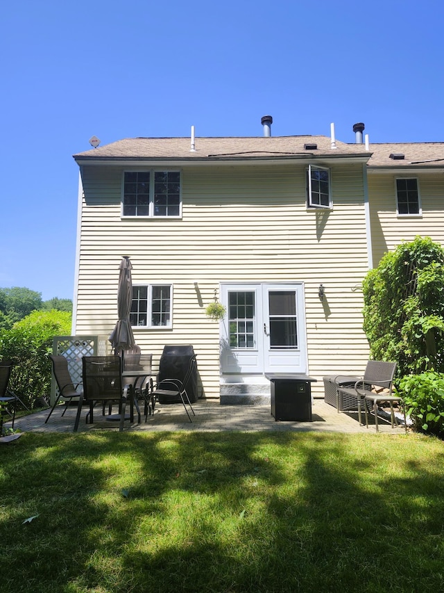 56 Hydrangea Cir Unit 10, Naples, ME 04055 - rear view of house with a patio area and a yard