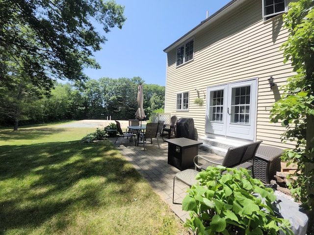 56 Hydrangea Cir Unit 10, Naples, ME 04055 - view of patio / terrace featuring french doors and grilling area