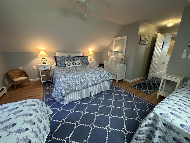 bedroom featuring a ceiling fan, baseboards, vaulted ceiling, and dark wood-type flooring