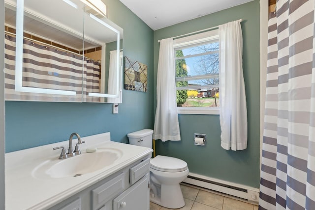 bathroom with baseboard heating, vanity, toilet, tile patterned floors, and a shower with curtain