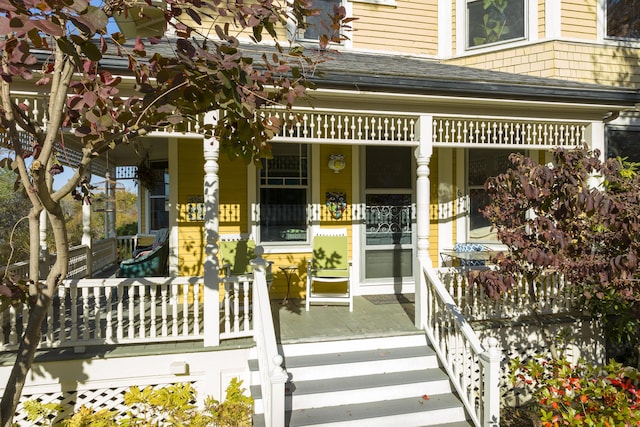 entrance to property with a porch