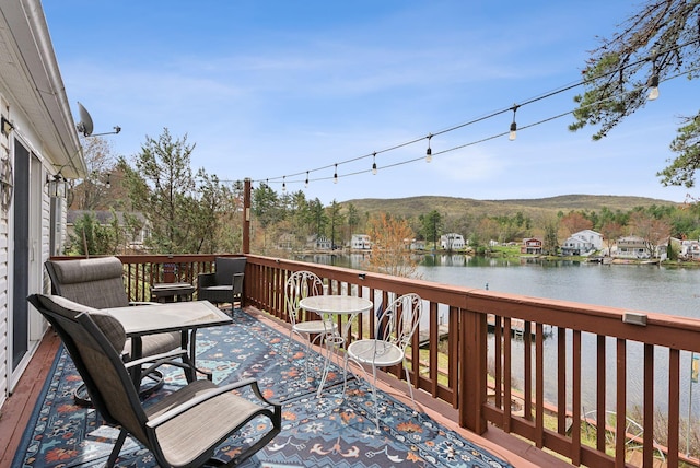 30 Swan Cir, Shapleigh, ME 04076 - wooden deck with a water view