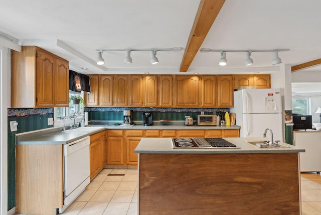 30 Swan Cir, Shapleigh, ME 04076 - kitchen with rail lighting, white appliances, a sink, and light tile patterned flooring