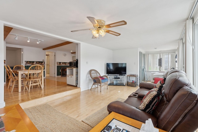 30 Swan Cir, Shapleigh, ME 04076 - living room featuring a ceiling fan and wood finished floors