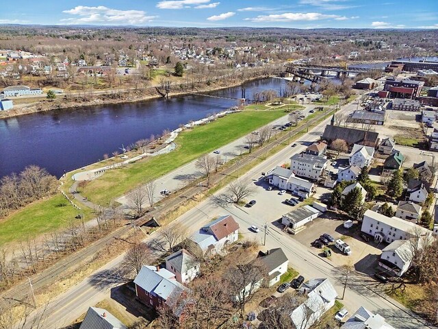 aerial view with a residential view and a water view