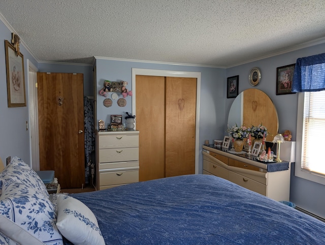 bedroom with crown molding, a closet, and a textured ceiling