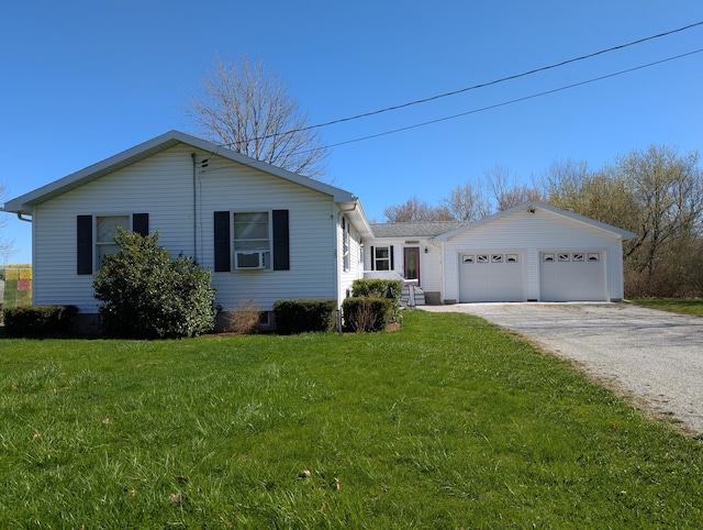 ranch-style home with cooling unit, driveway, and a front lawn