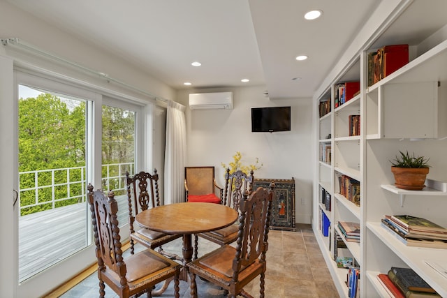dining space featuring recessed lighting and a wall mounted air conditioner
