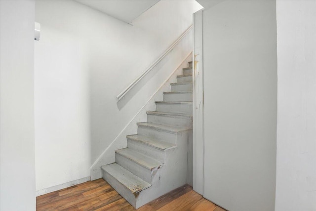84 Main St, Dixfield, ME 04224 - stairs featuring wood finished floors