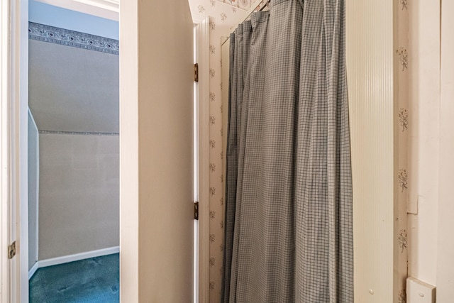 bathroom with baseboards